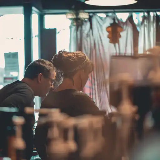 Man and woman discussing Business Loan Protection