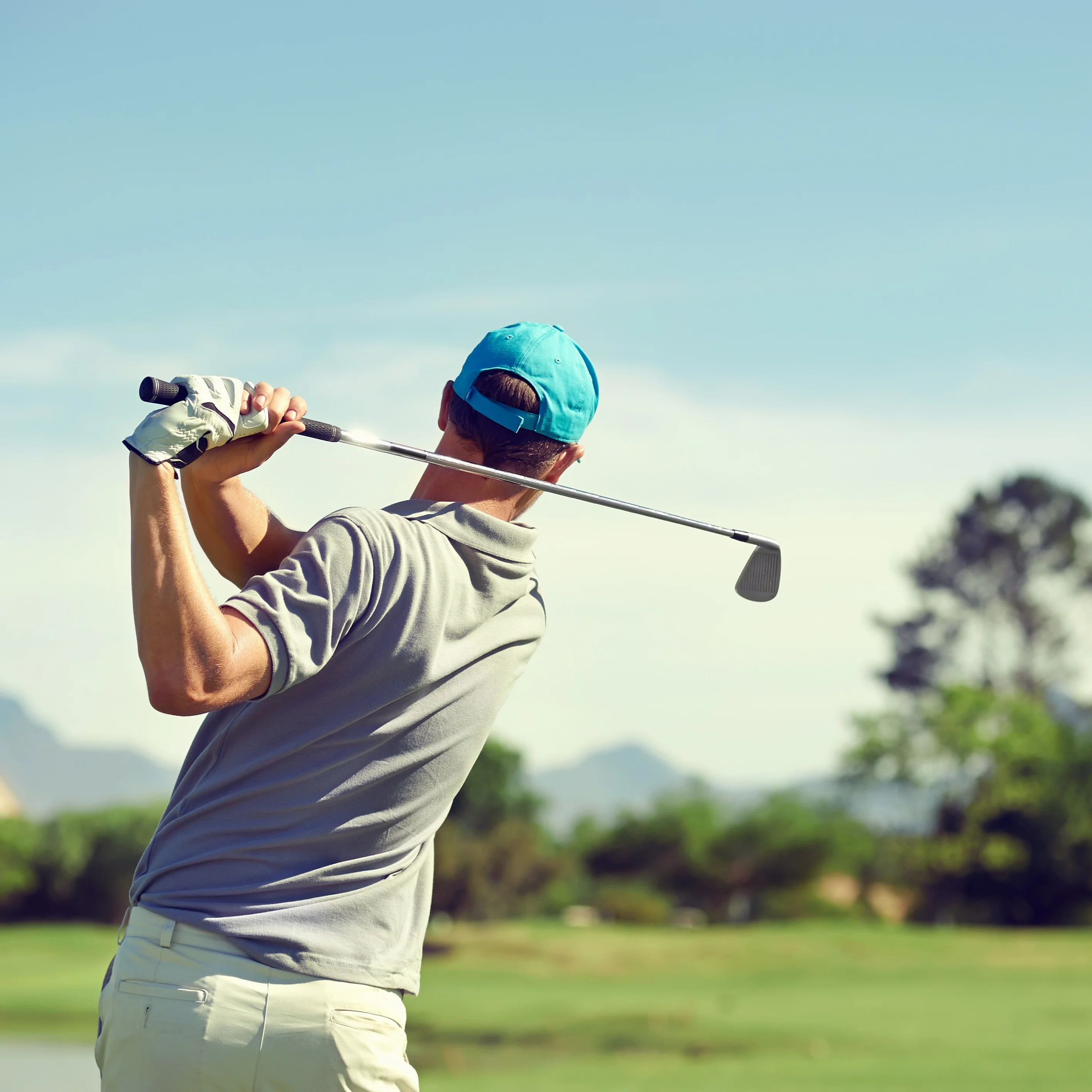 Golfer Hitting A Golf Shot